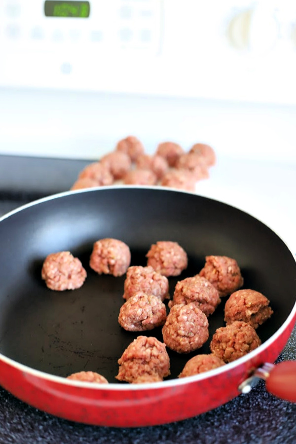 Easy recipe for Sweet and sour meatballs. Bell peppers and carrots are cooked crisp tender and added with pineapple chunks to a lightly tangy sauce. Serve over rice for a great weeknight or family dinner.