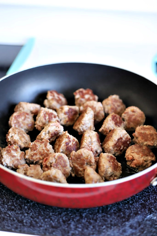 Easy recipe for Sweet and sour meatballs. Bell peppers and carrots are cooked crisp tender and added with pineapple chunks to a lightly tangy sauce. Serve over rice for a great weeknight or family dinner.