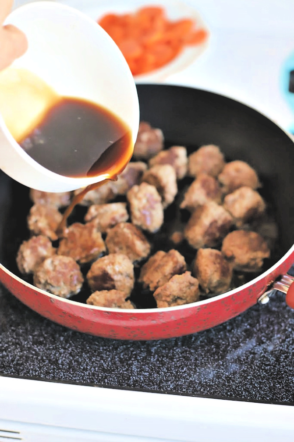 Easy recipe for Sweet and sour meatballs. Bell peppers and carrots are cooked crisp tender and added with pineapple chunks to a lightly tangy sauce. Serve over rice for a great weeknight or family dinner.