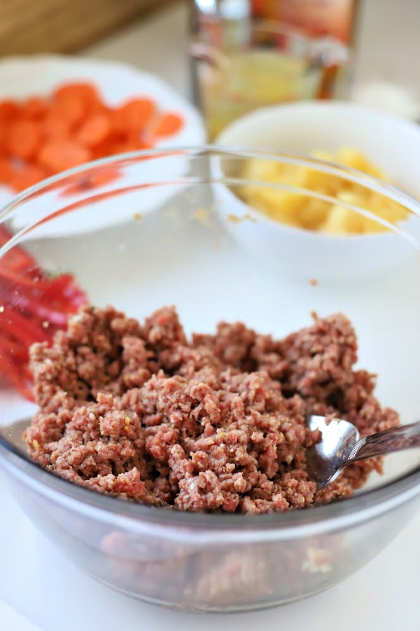 Easy recipe for Sweet and sour meatballs. Bell peppers and carrots are cooked crisp tender and added with pineapple chunks to a lightly tangy sauce. Serve over rice for a great weeknight or family dinner.