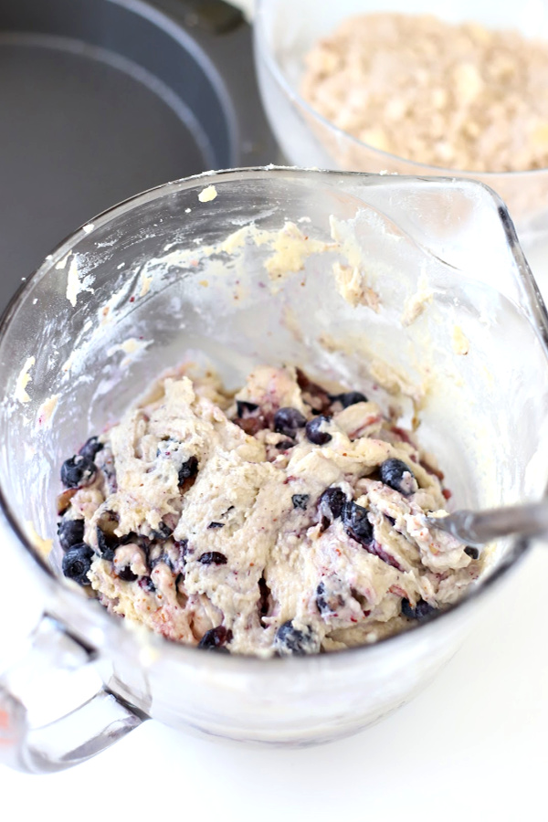 An easy recipe, blueberry buckle coffee cake is a favorite old-fashioned dessert. Moist, delicious with a sweet crumb streusel topping it is just right for snacking, breakfast or brunch.