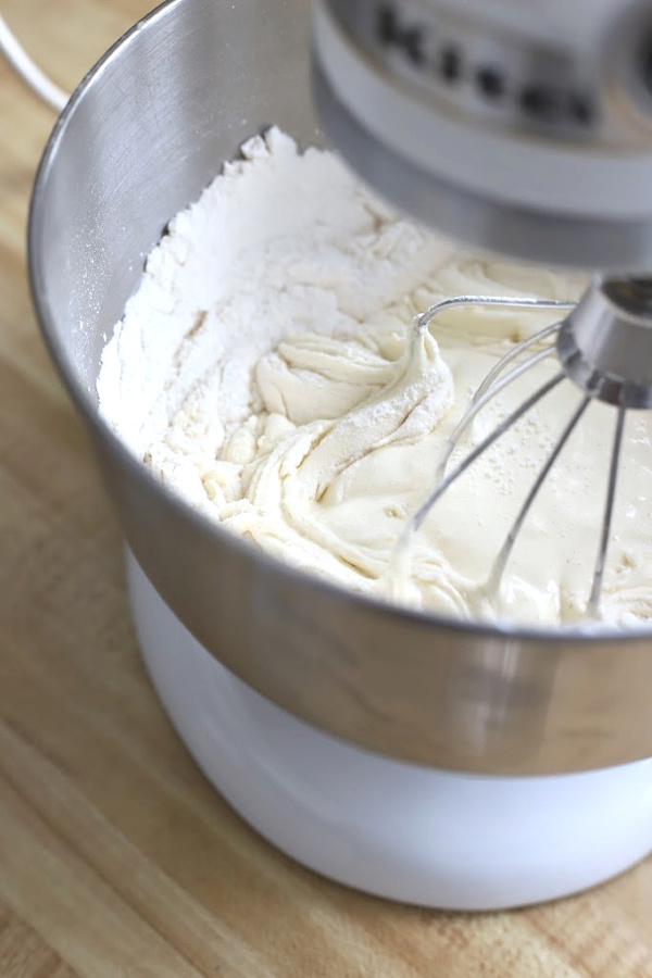 An easy recipe, coconut lemon cake is made with coconut milk, shredded coconut and a little rum, if desired. Baked in a Bundt pan it is similar to pound cake and so good with tea and coffee. Serve for dessert or slice and toast for a breakfast treat.