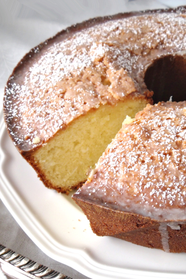 Easy recipe for coconut lemon cake made with coconut milk is similar to pound cake, baked in a Bundt pan,  and is a lovely tea time or coffee break dessert. 