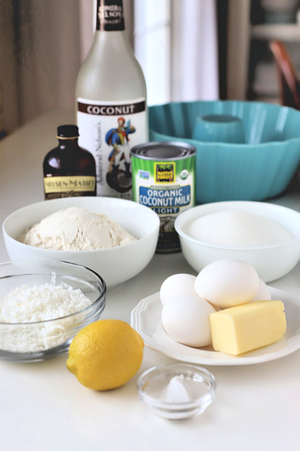 An easy recipe, coconut lemon cake is made with coconut milk, shredded coconut and a little rum, if desired. Baked in a Bundt pan it is similar to pound cake and so good with tea and coffee. Serve for dessert or slice and toast for a breakfast treat.