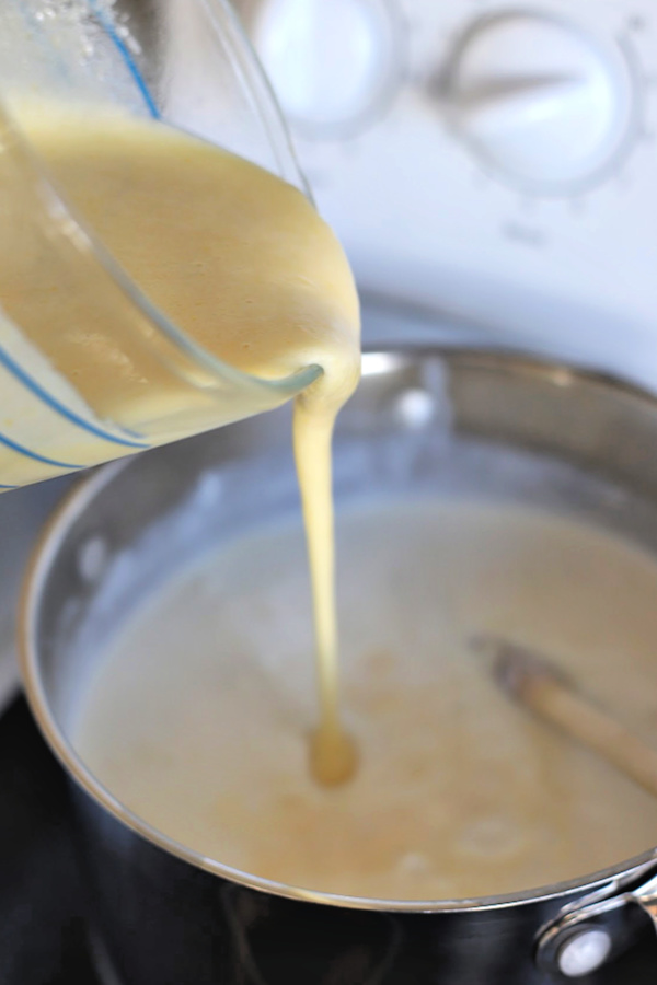 Easy recipe for creamy rice pudding. This old-fashioned dessert is not overly sweet. Simmered gently on the stove top until the rice is tender but not mushy, it turns out perfect time after time.