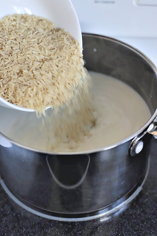 Easy recipe for creamy rice pudding. This old-fashioned dessert is not overly sweet. Simmered gently on the stove top until the rice is tender but not mushy, it turns out perfect time after time.