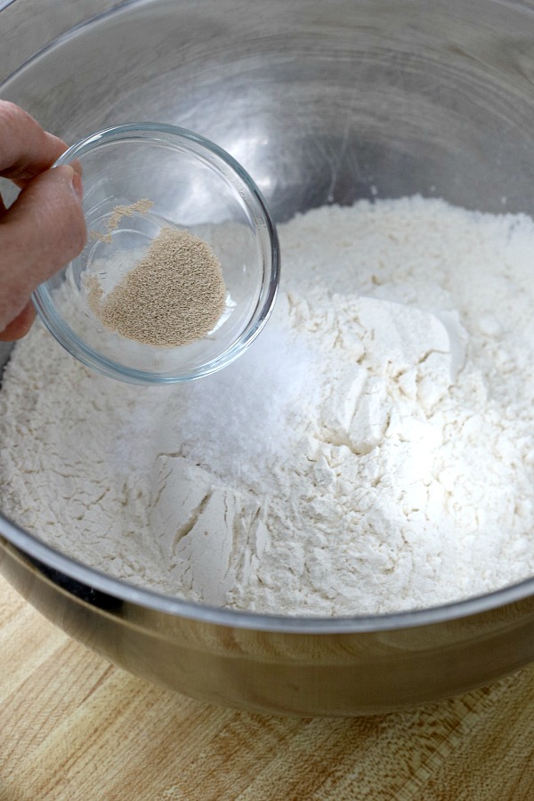 Homemade rustic bread with a crusty exterior and deliciously chewy center with easy almost no-knead recipe from Cooks Illustrated.