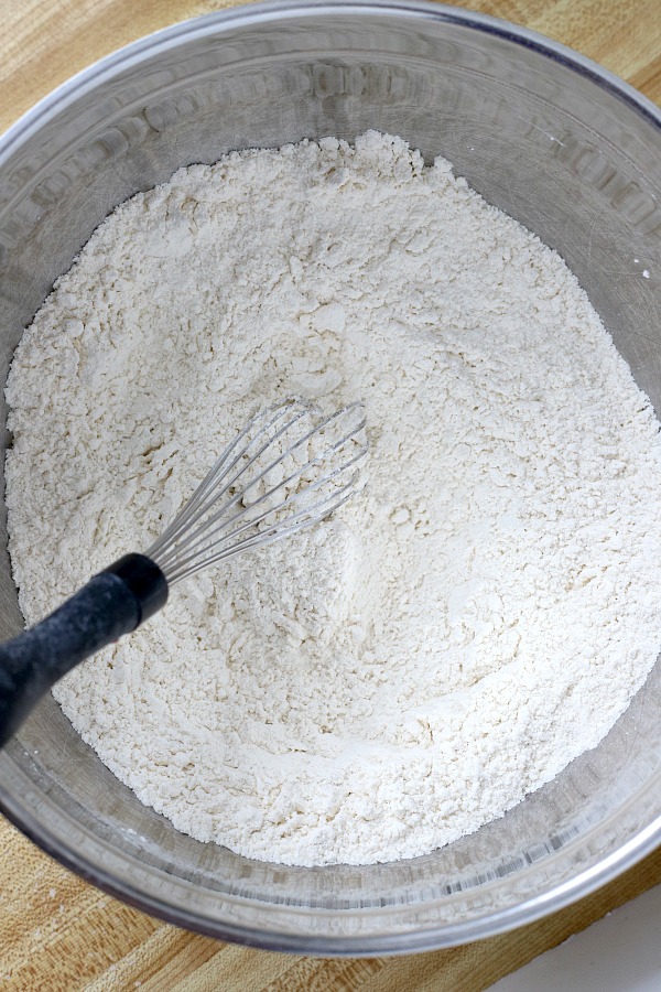 Homemade rustic bread with a crusty exterior and deliciously chewy center with easy almost no-knead recipe from Cooks Illustrated.