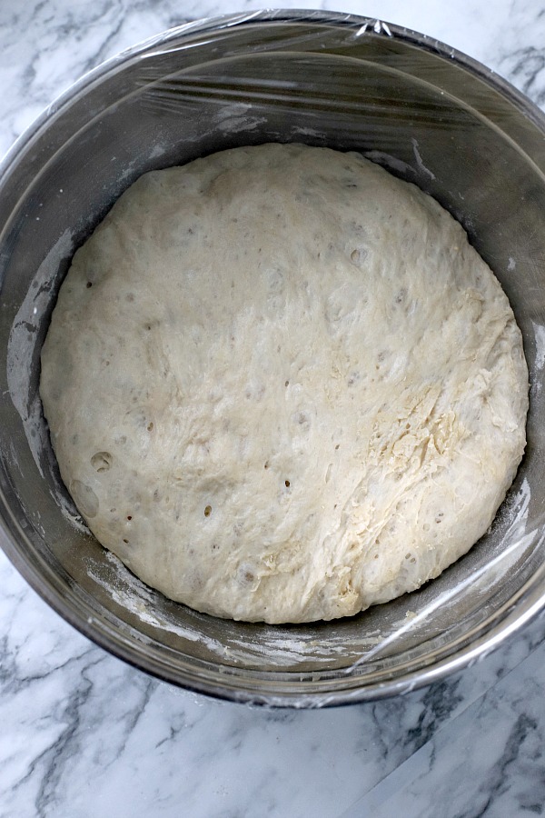 Homemade rustic bread with a crusty exterior and deliciously chewy center with easy almost no-knead recipe from Cooks Illustrated.