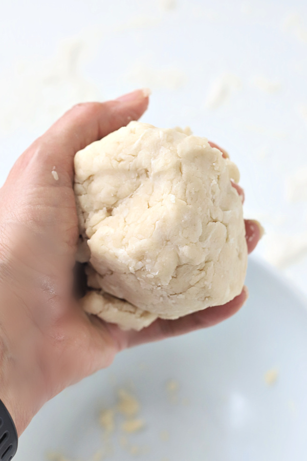 Making you own homemade pie crust is a lot easier than you think and much less expensive.  Easy step-by-step photos for a perfect crust using shortening for your apple, pumpkin and savory pies.