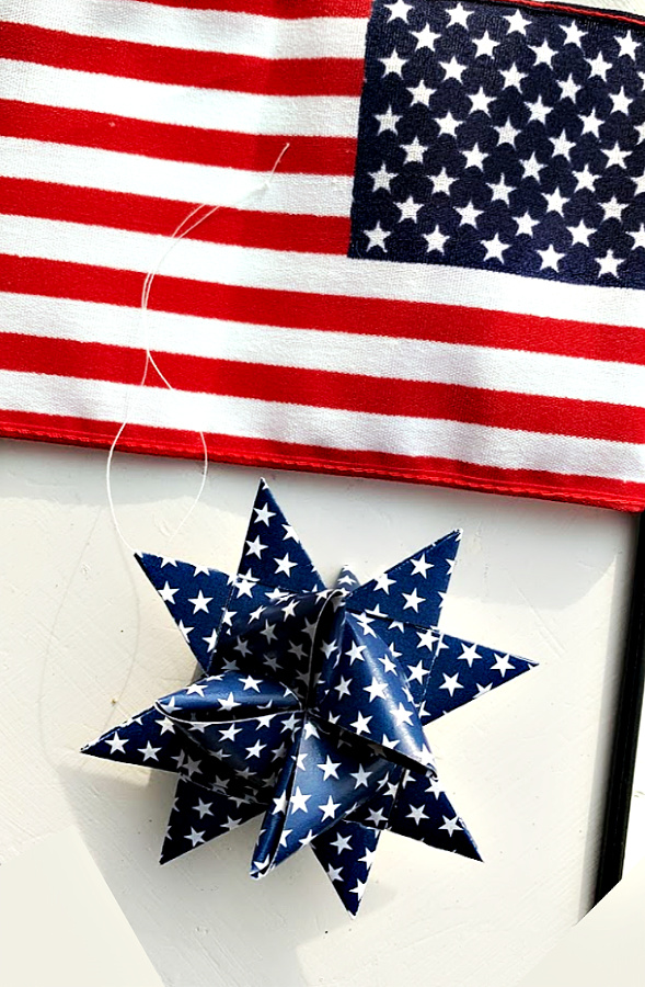 Easy step-by-step video tutorial how-to for patriotic paper stars perfect for 4th of July, Memorial Day or the military hero in your life. Made by folding and turning strips of paper creating a lovely 16-pointed, three dimensional ornament.