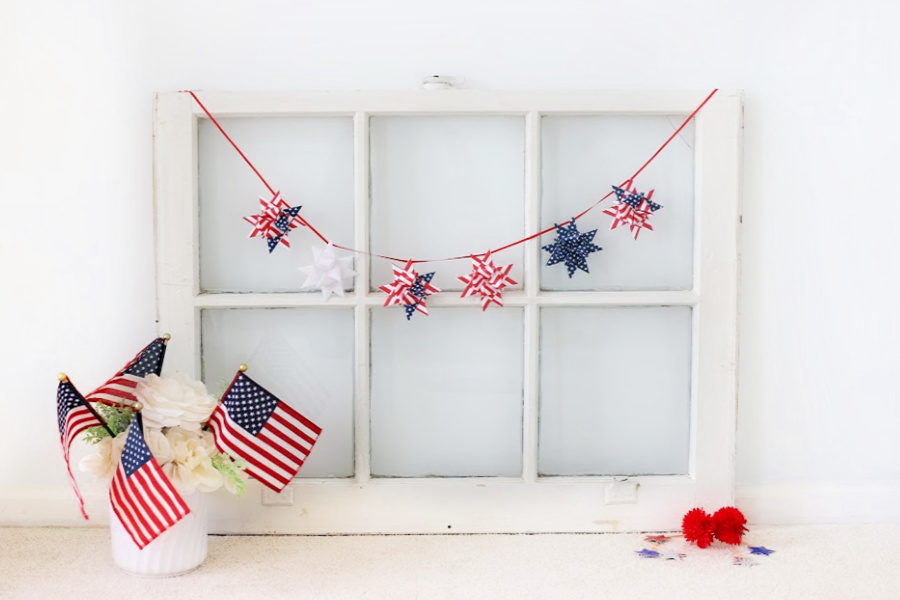 Easy step-by-step video tutorial how-to for paper patriotic stars. Fold and turn strips of paper to create a lovely 16-pointed, three dimensional ornament. Festive and perfect for 4th of July or the military hero in your life.