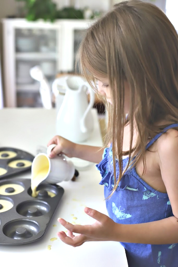 Make a batch of homemade baked cake donuts. Easy recipe and fun to make with kids or grandchildren. Add chocolate frosting, powered sugar, cinnamon sugar or just leave plain.