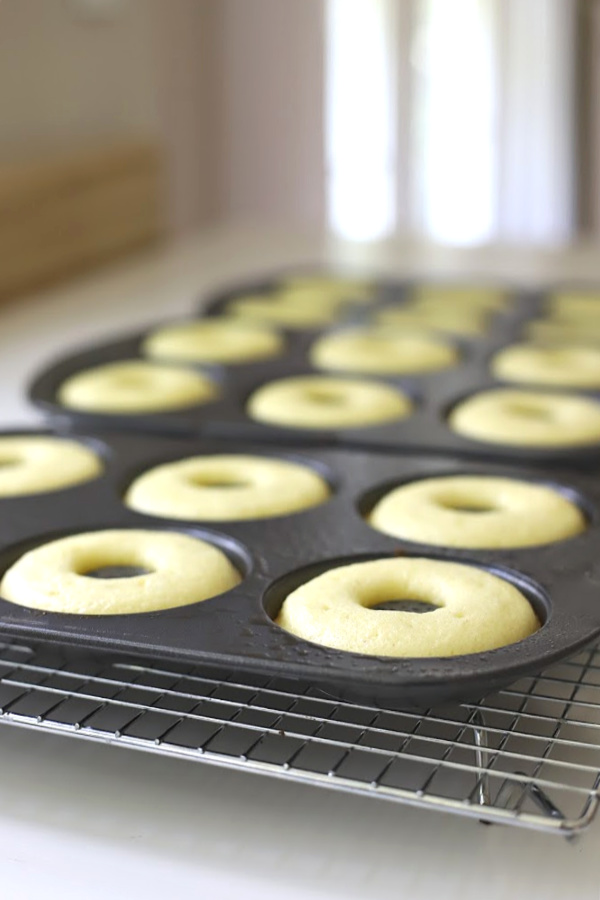 Make a batch of homemade baked cake donuts. Easy recipe and fun to make with kids or grandchildren. Add chocolate frosting, powered sugar, cinnamon sugar or just leave plain.