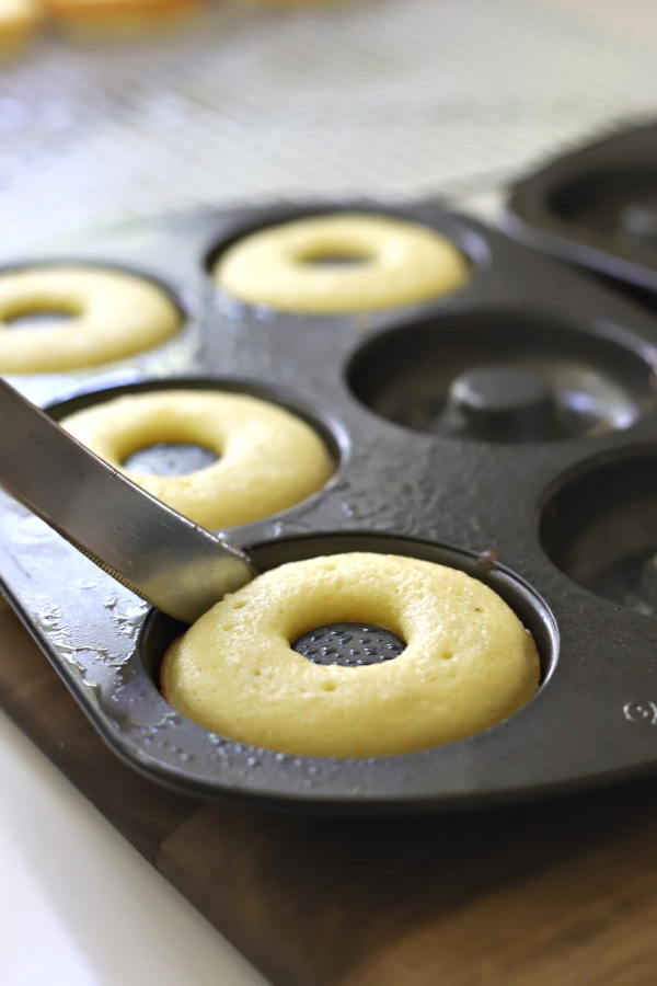 Make a batch of homemade baked cake donuts. Easy recipe and fun to make with kids or grandchildren. Add chocolate frosting, powered sugar, cinnamon sugar or just leave plain.