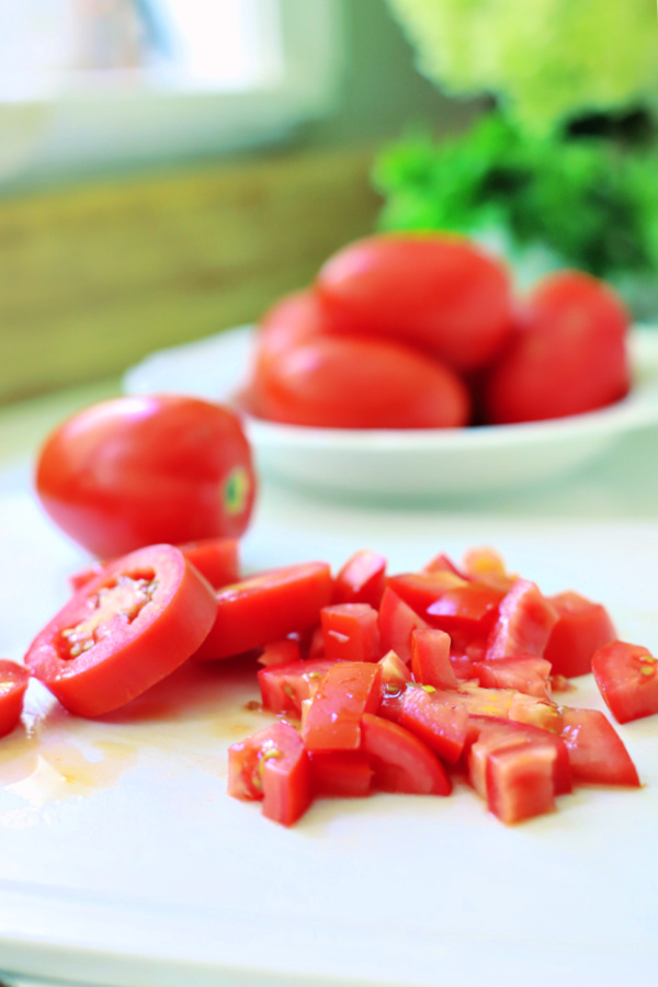 Easy recipe for old fashioned scalloped tomatoes.