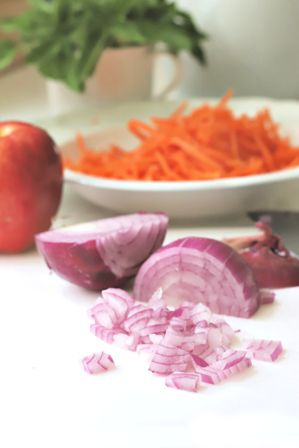 Easy recipe for making an apple carrot slaw that is crunchy, creamy and healthy.