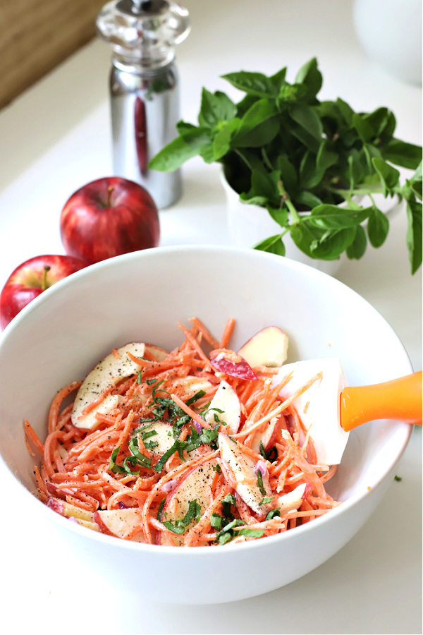 Easy recipe for making an apple carrot slaw that is crunchy, creamy and healthy.