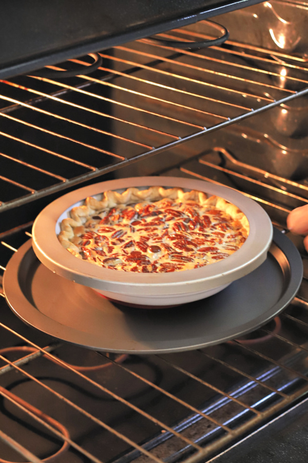 Pie shield for baking a chocolate pecan pie