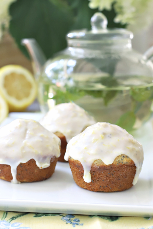 An easy recipe for poppy seed muffins with nutritional benefits of wheat germ. Topped with lemon glaze. Perfect for snack, breakfast & lunch.