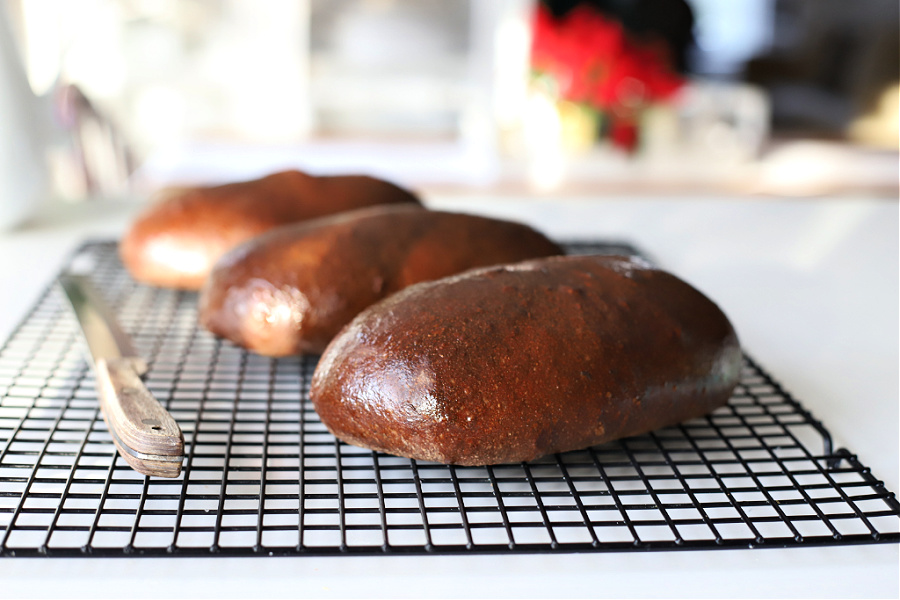 Easy recipe for delicious, honey wheat dark brown bread using a bread machine for the dough. Slightly sweet from molasses similar to Outback or Lone Star loaves.