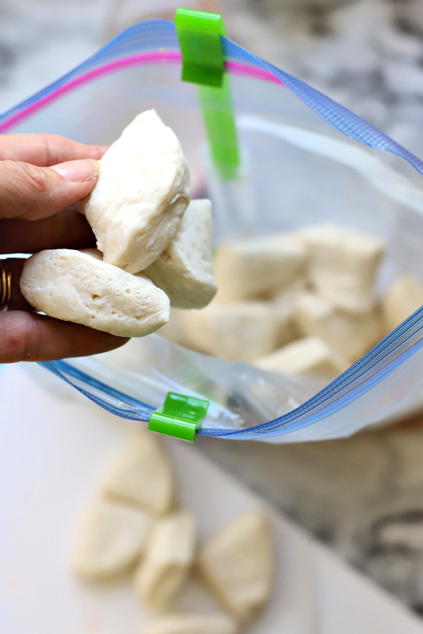 Cutting biscuits for homemade monkey bread