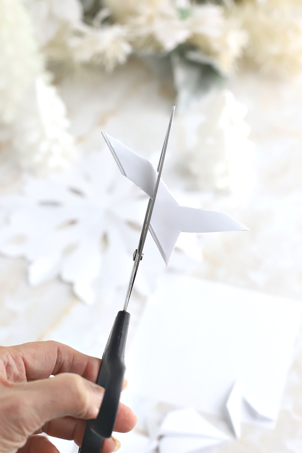 intricate cuts for pretty paper snowflakes.