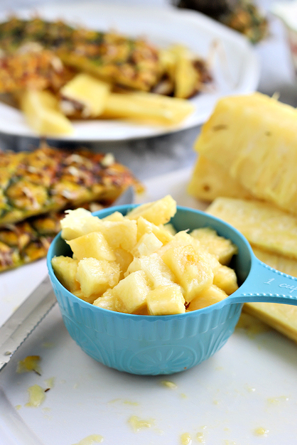 chopping fresh pineapple