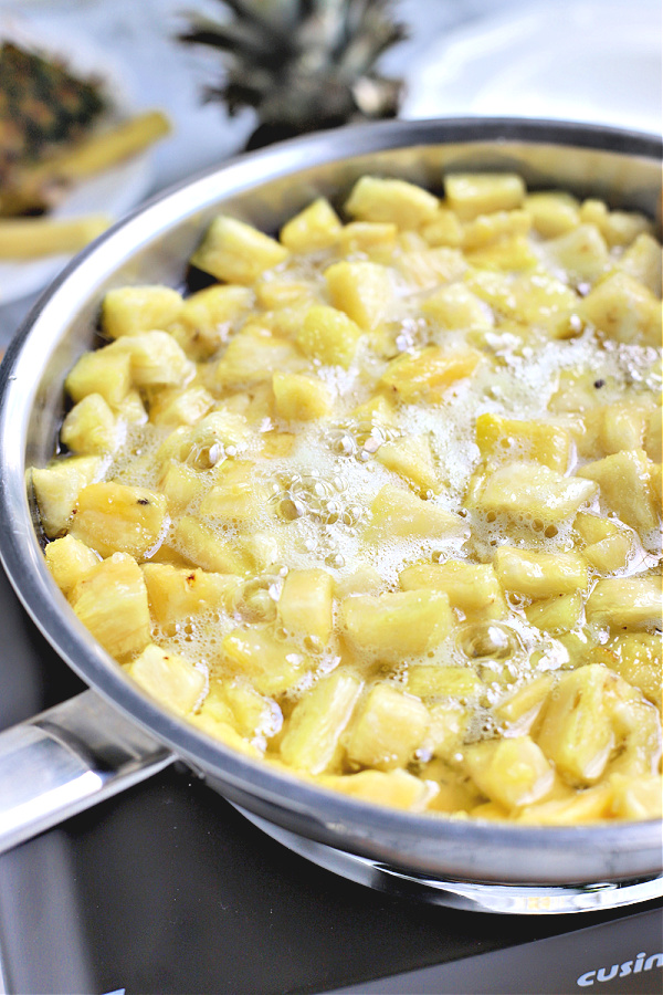 simmering fresh pineapple with sugar for Pineapple jam