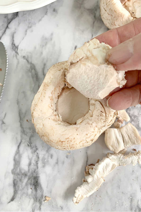 removing mushroom stems for sausage stuffed mushrooms