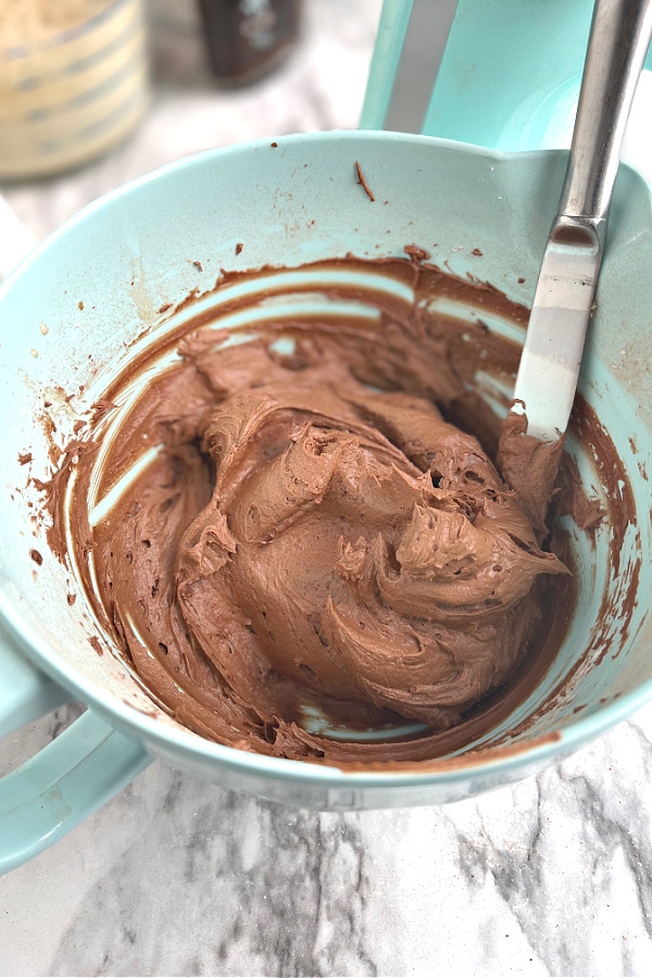 Making the chocolate frosting for Christmas yule log.