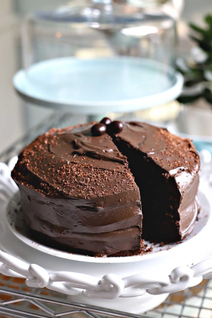 An easy recipe for dark, rich chocolate mocha cake with fluffy chocolate frosting is decadent and a perfect birthday celebration dessert.