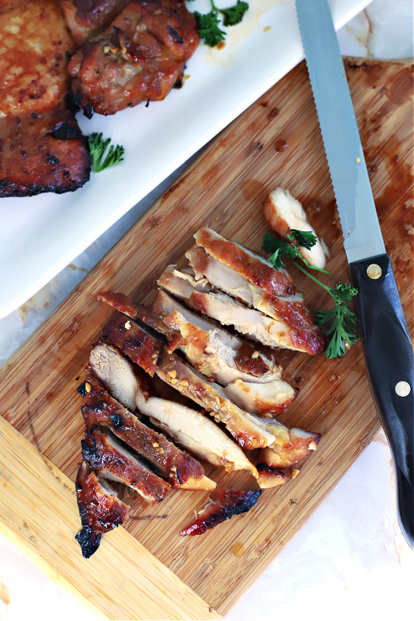 Two easy recipes for skinless, boneless chicken thighs made in an air fryer. Marinated honey ginger Asian and a simple basted BBQ version.