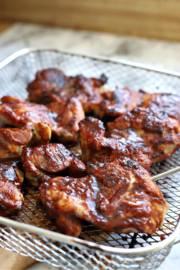 BBQ skinless, boneless air fryer chicken thighs.