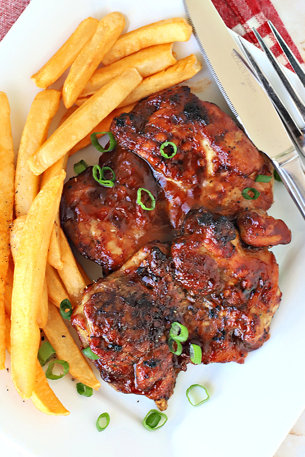 Easy recipe and how-to for cooking boneless, skinless Sweet Baby Rays BBQ Air Fryer Chicken Thighs.