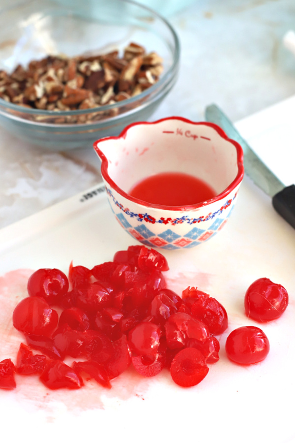 Chopping Maraschino cherries for Hummingbird Cake.