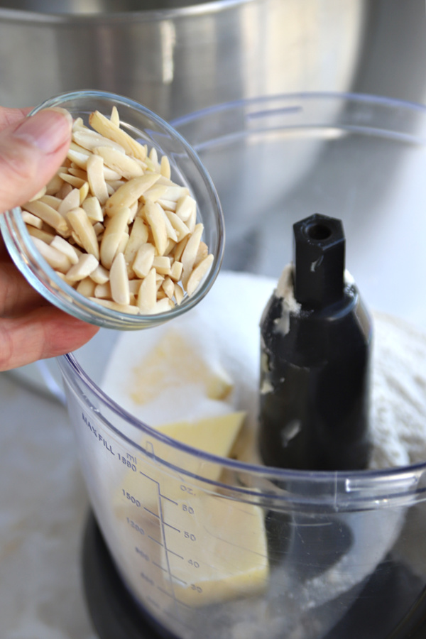 Adding ground almonds for the NY style cheesecake crust.