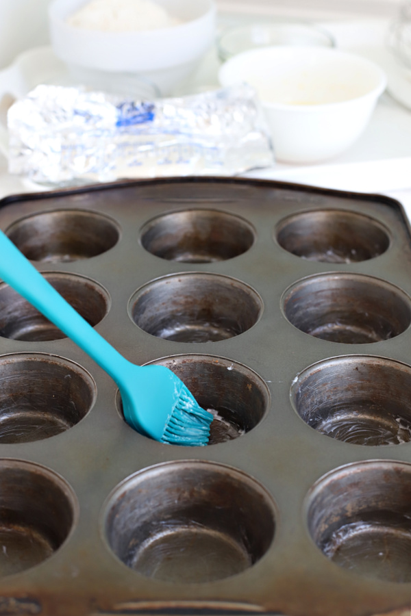 greasing the pan for making basic muffins