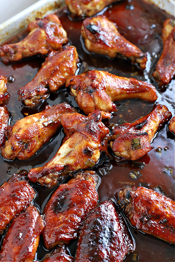 Basting honey garlic soy sauce chicken wings appetizer recipe.