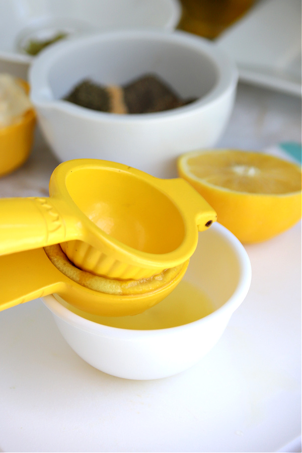 juicing a lemon for tartar sauce