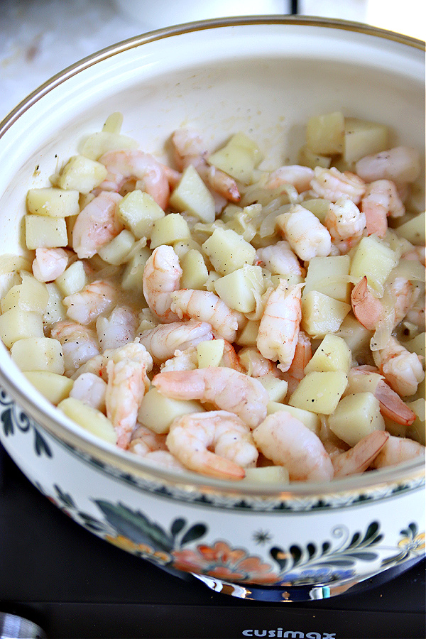 Potatoes and seasonings for shrimp and corn chowder recipe.