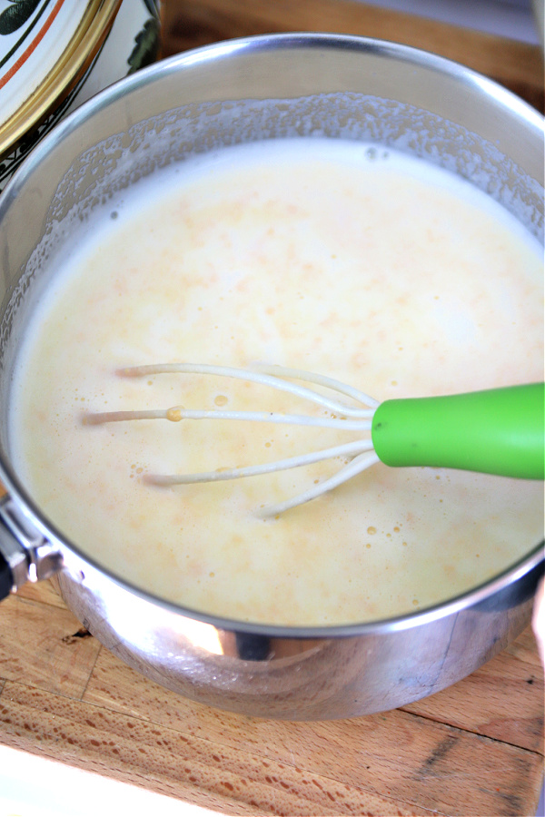 Making the broth for shrimp and corn chowder soup.