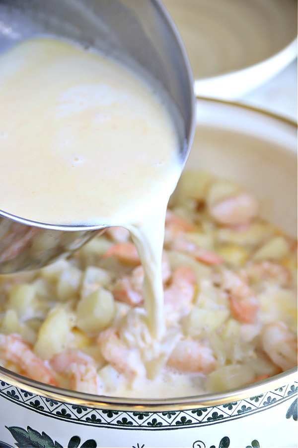 Making the broth for shrimp and corn chowder soup.