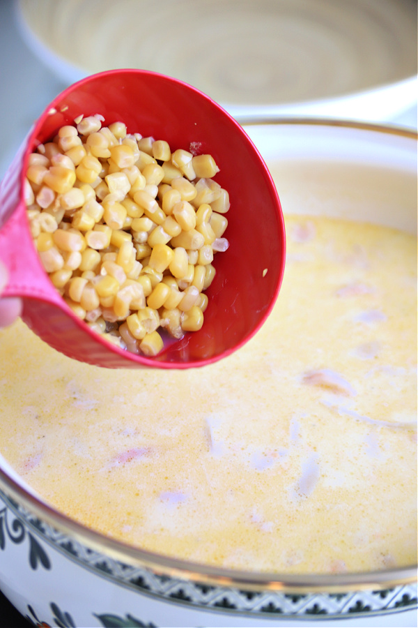 Making the broth for shrimp and corn chowder soup.