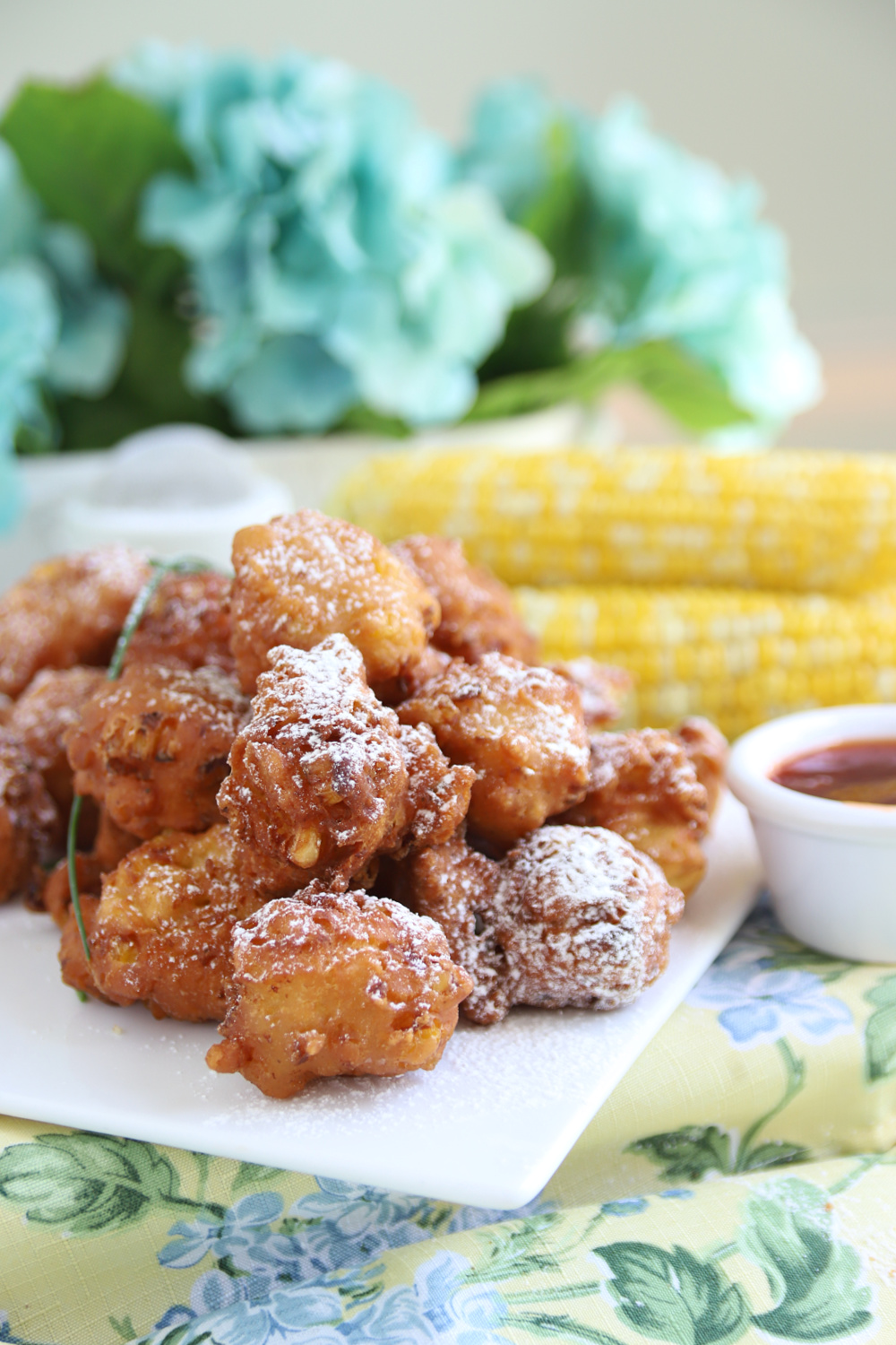 Easy recipe for old fashioned corn fritters. A great summer appetizer or side with burgers, hotdogs, and grilled chicken.