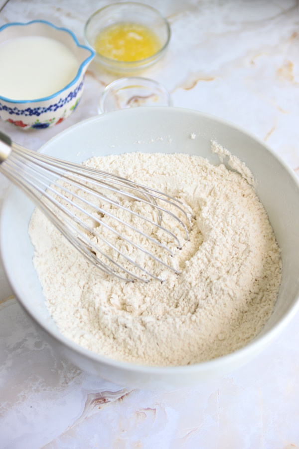 Whisking dry ingredients for corn fritter recipe.