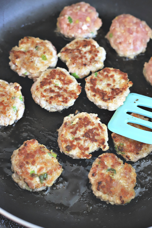 Pan frying ground pork meatballs for bulgogi sauce entree