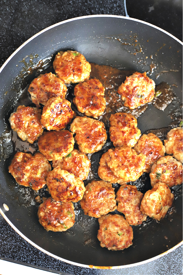 Pan frying ground pork meatballs for bulgogi sauce entree