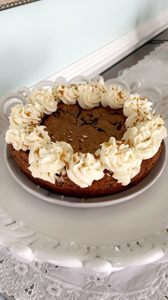 chocolate chip cookie cake with buttercream frosting